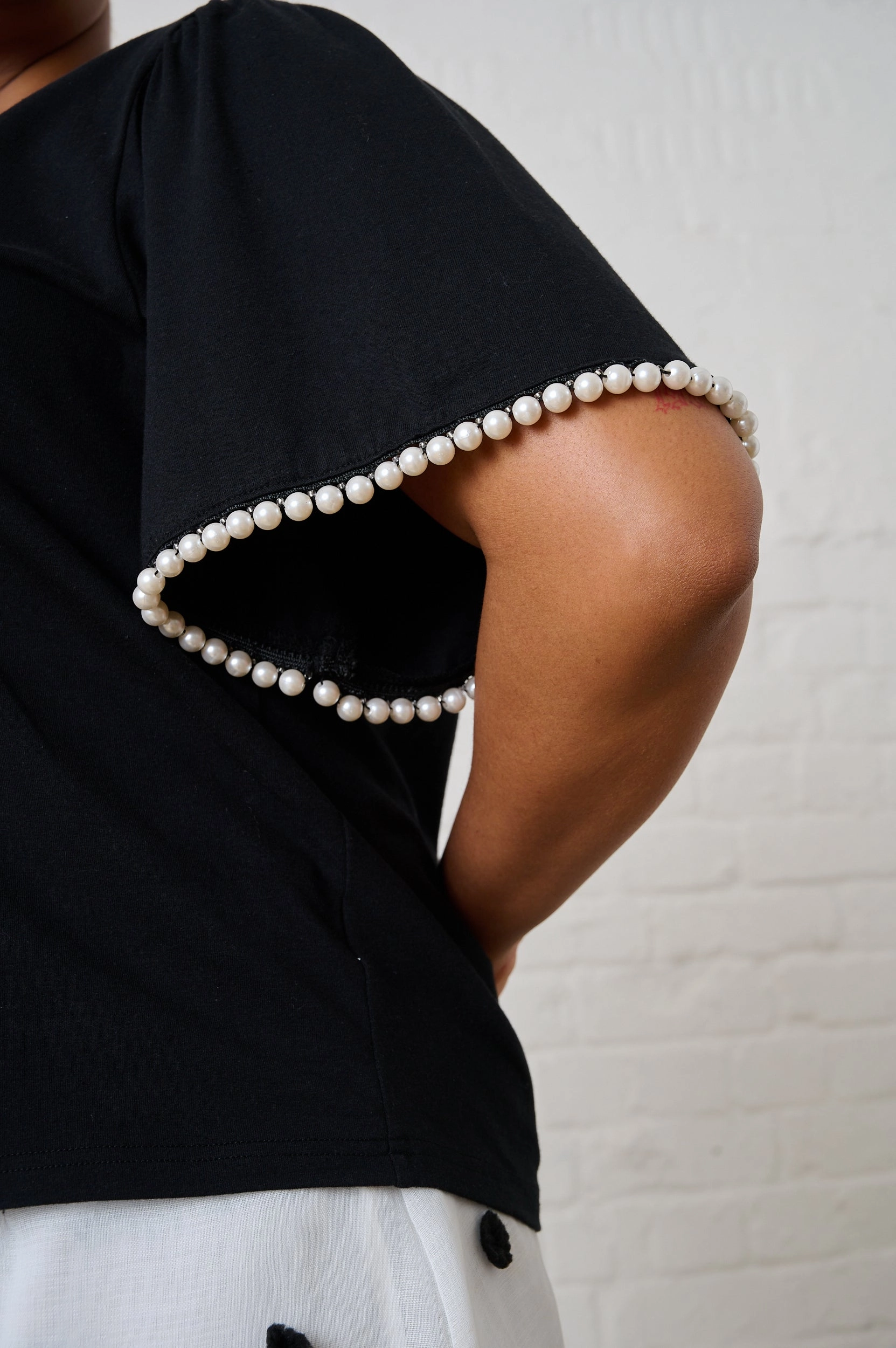 Boxy Tee in Black with Pearl Trim Lightweight insulation