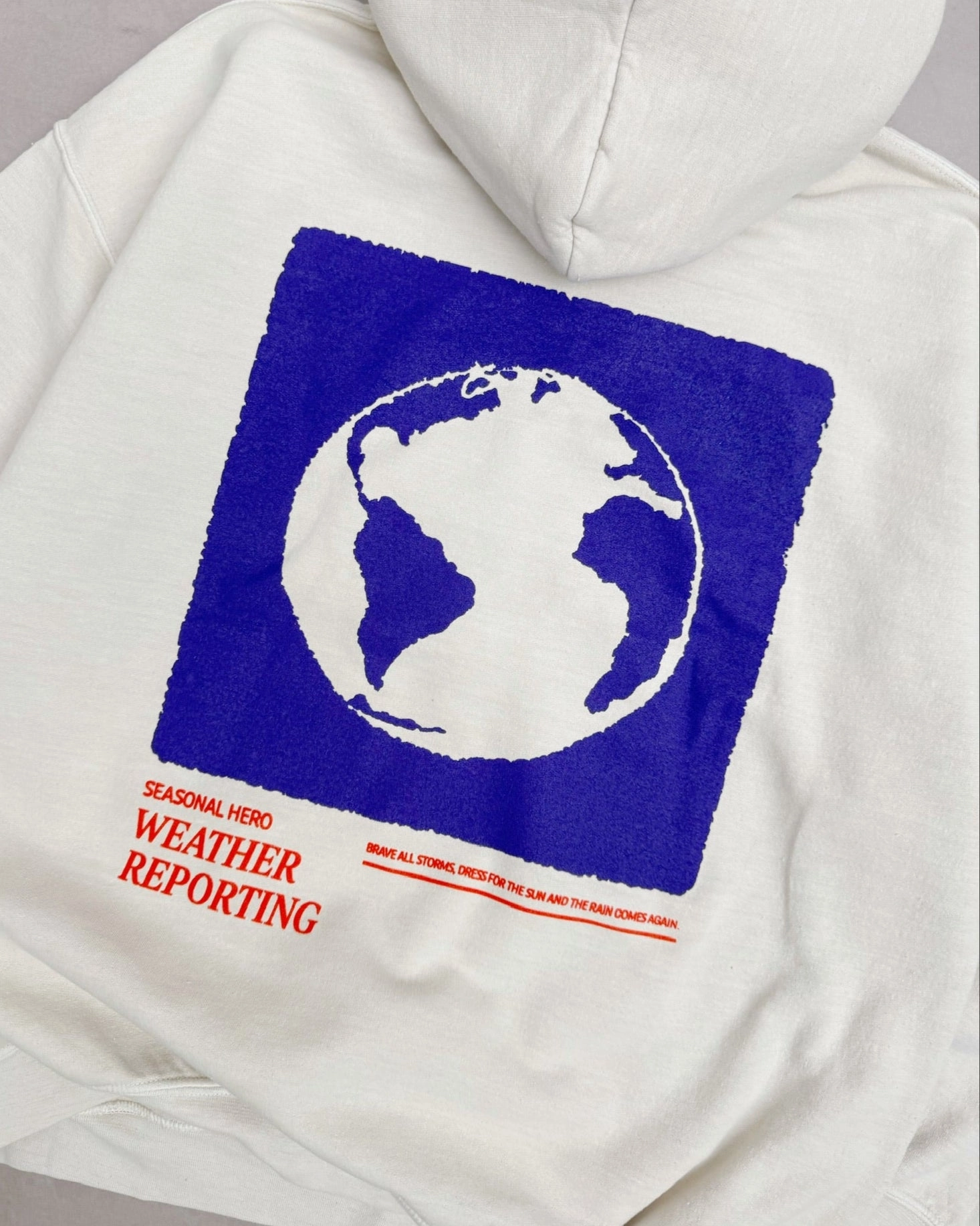 Seasonal Hero 'Weather Reporting' Washed Hoodie - Cream Numbat like