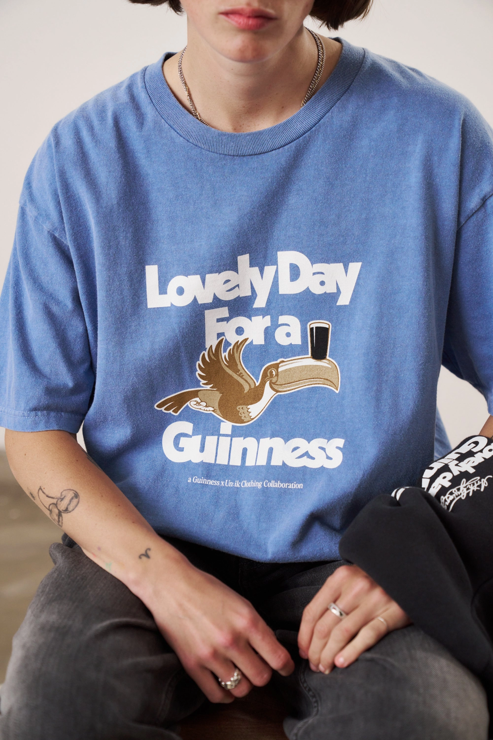 Guinness x UN:IK 'Lovely Day' Vintage Washed Tee - Blue sale season Casual Vibes