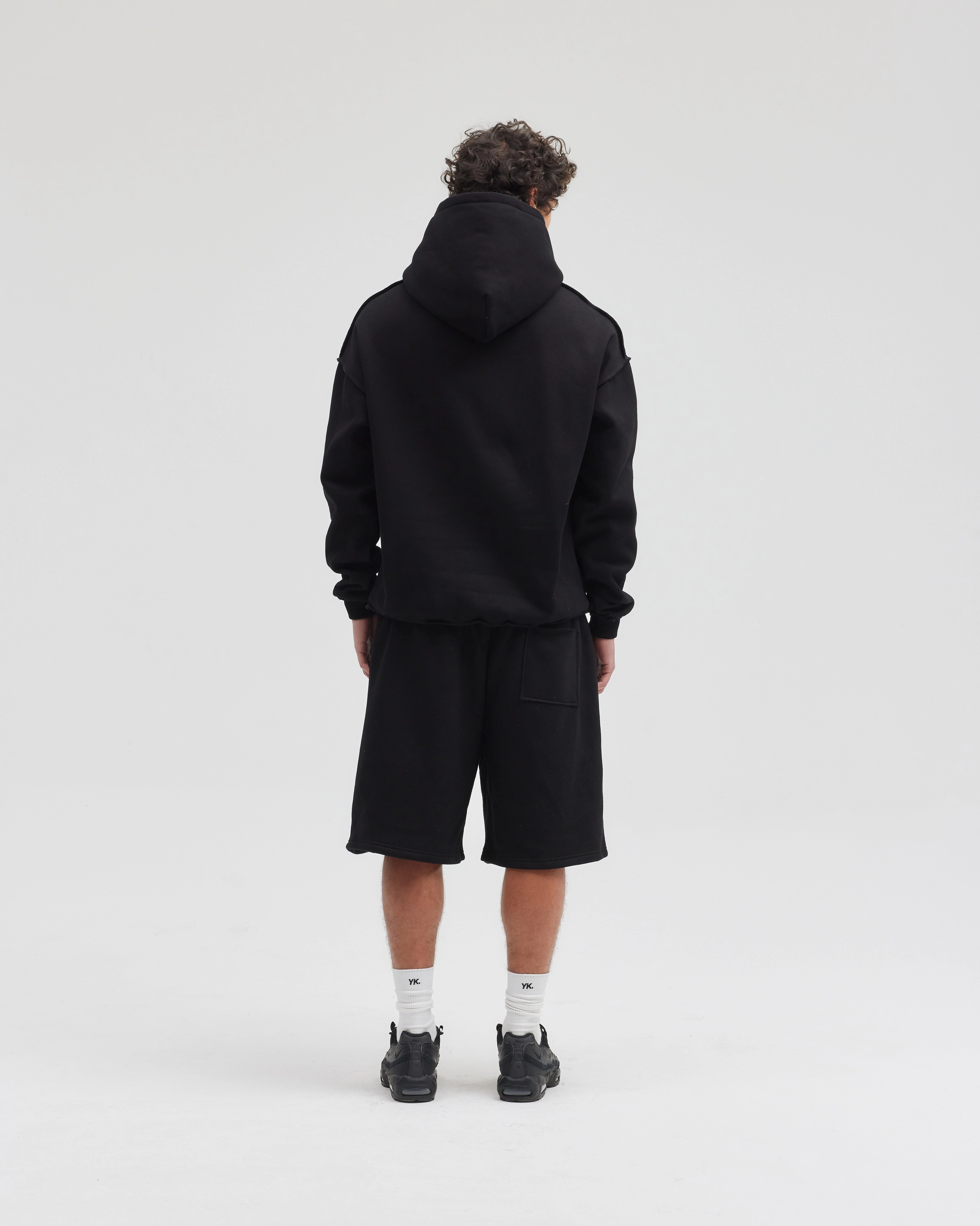 Exposed Seam Hoodie | Black Water resistant coating