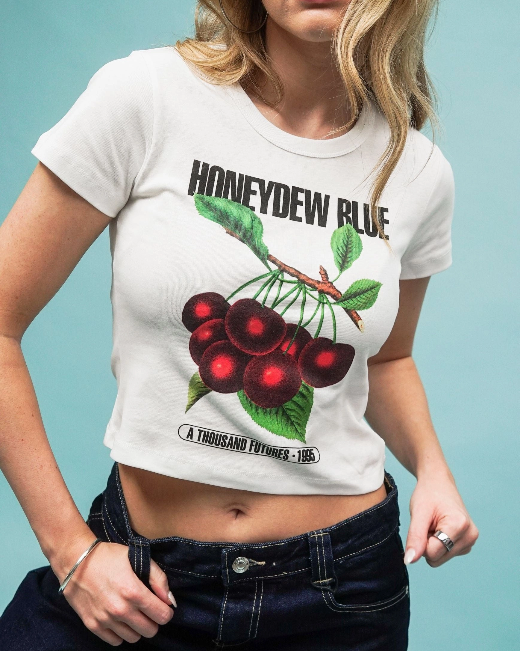 Sleeveless freedom Fur combination A Thousand Futures 'Honeydew Blue' Baby Tee - White