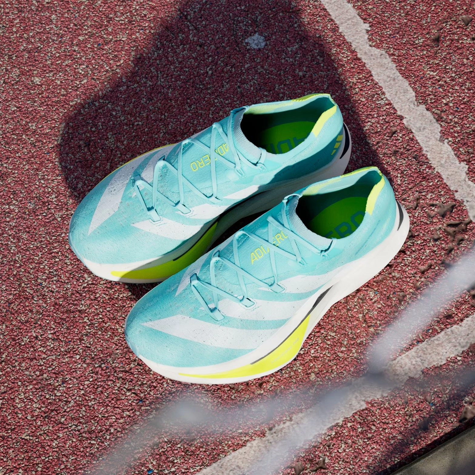 Adizero Prime X 3 Strung Running Shoes Flash Aqua / Zero Metalic / Lucid Lemon Stable Landing Platform running for a way to stay motivated