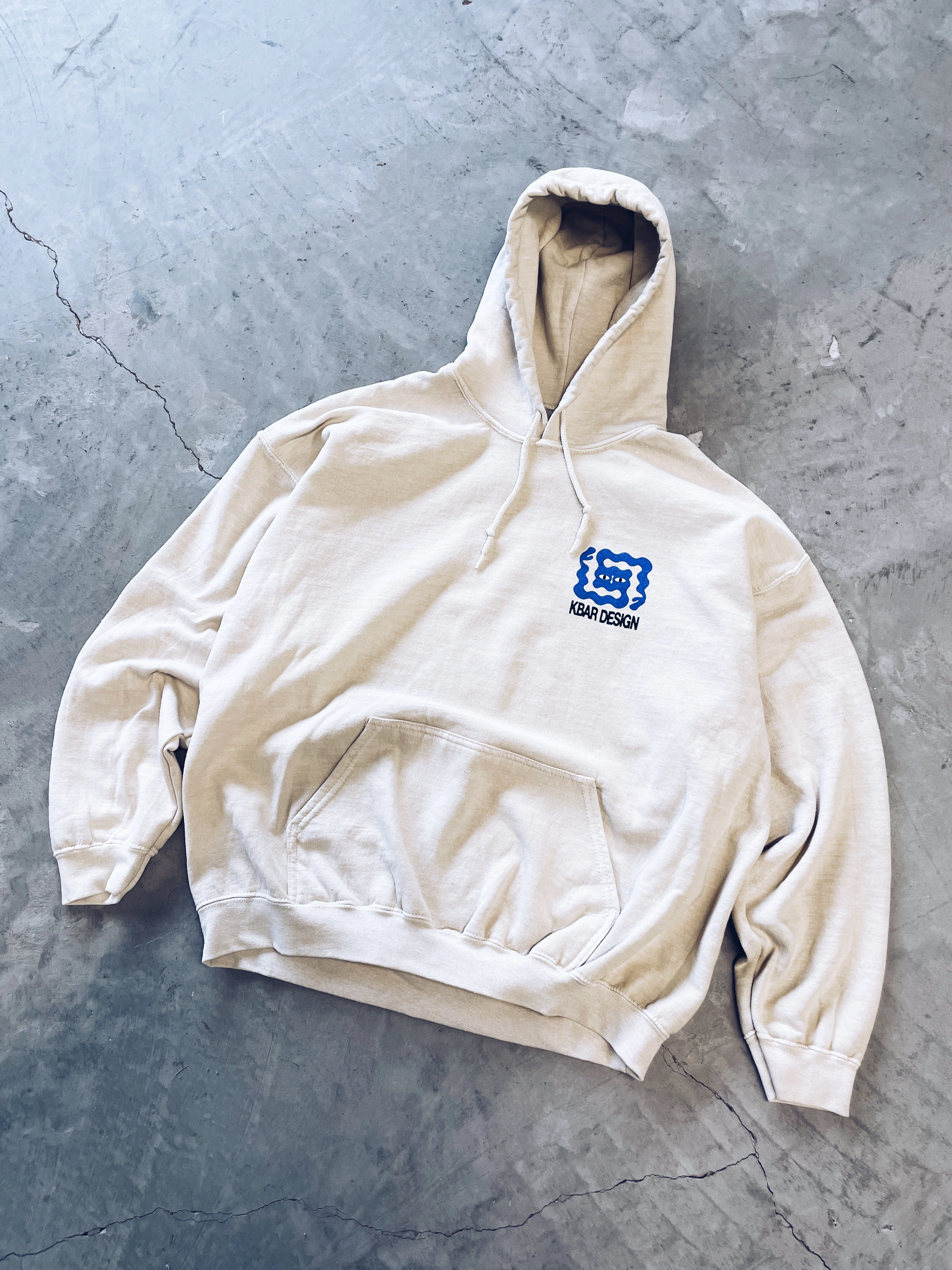 KBAR X UN:IK 'Logo' Vintage Washed Hoodie - Ivory Embroidered Logo