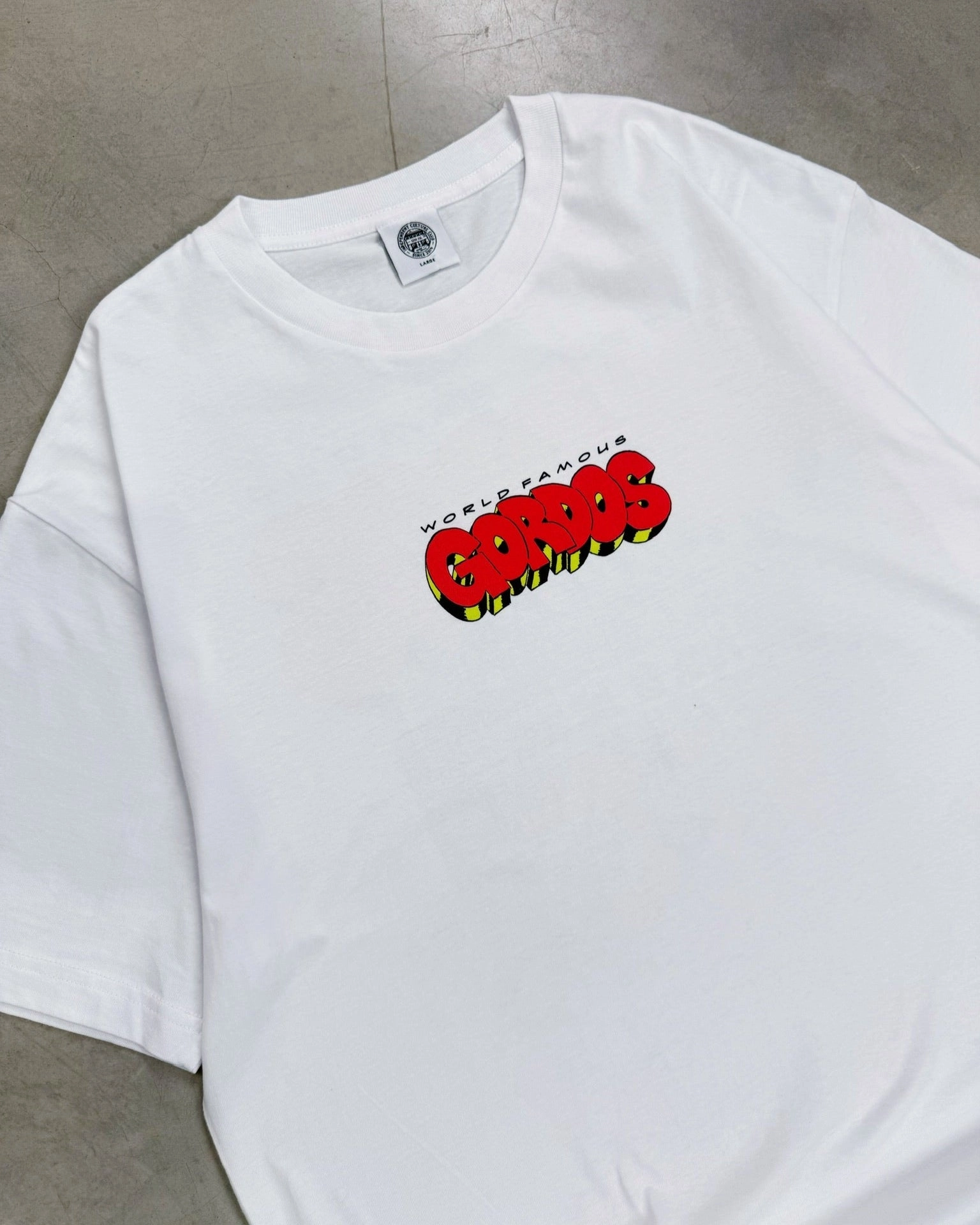 World Famous Gordos x Freako Rico Tee - White Wrinkle Free Fabric Multi Directional Stretch