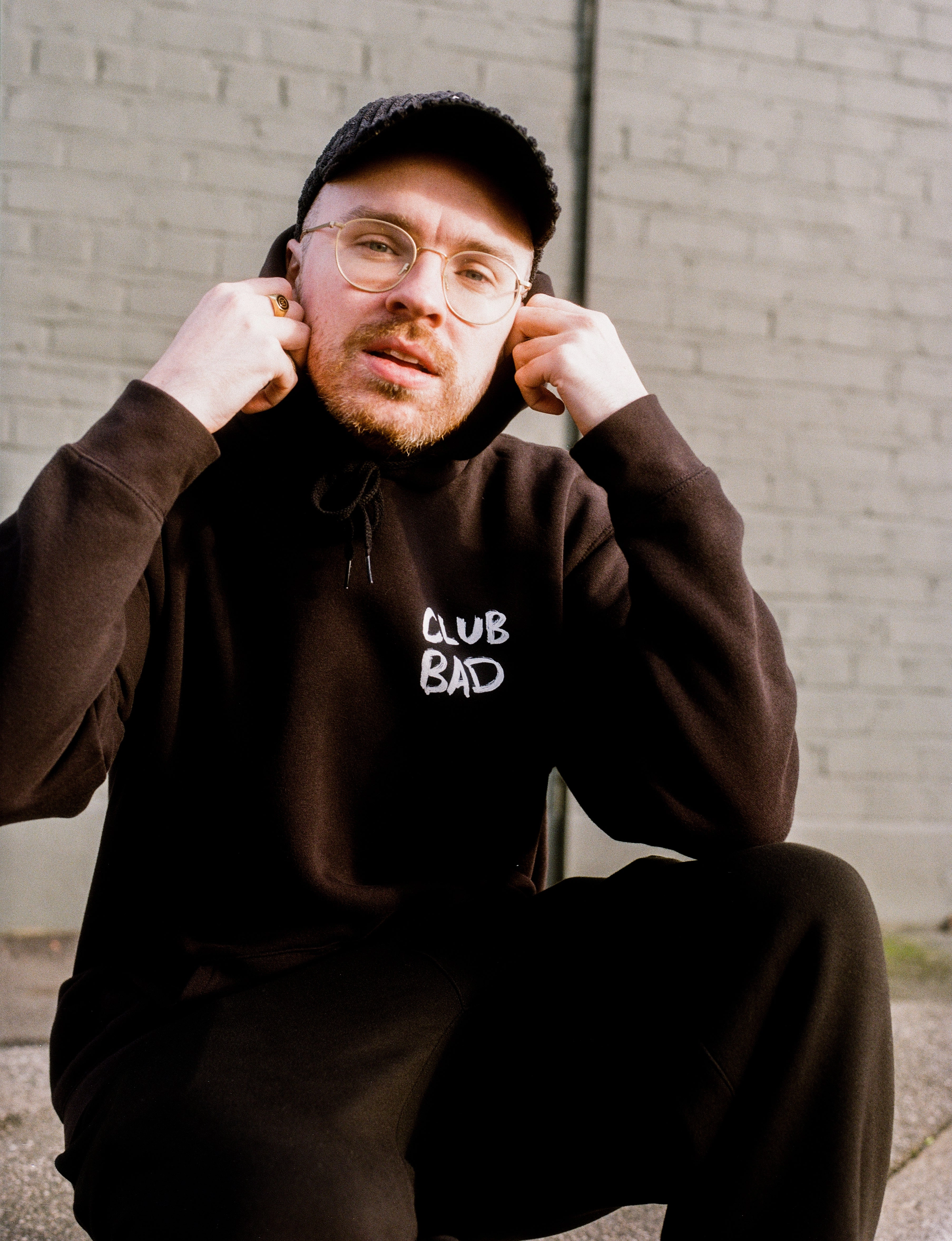 Mel?? X Club Bad 'Crossed Legs' Hoodie - Black Freedom of movement