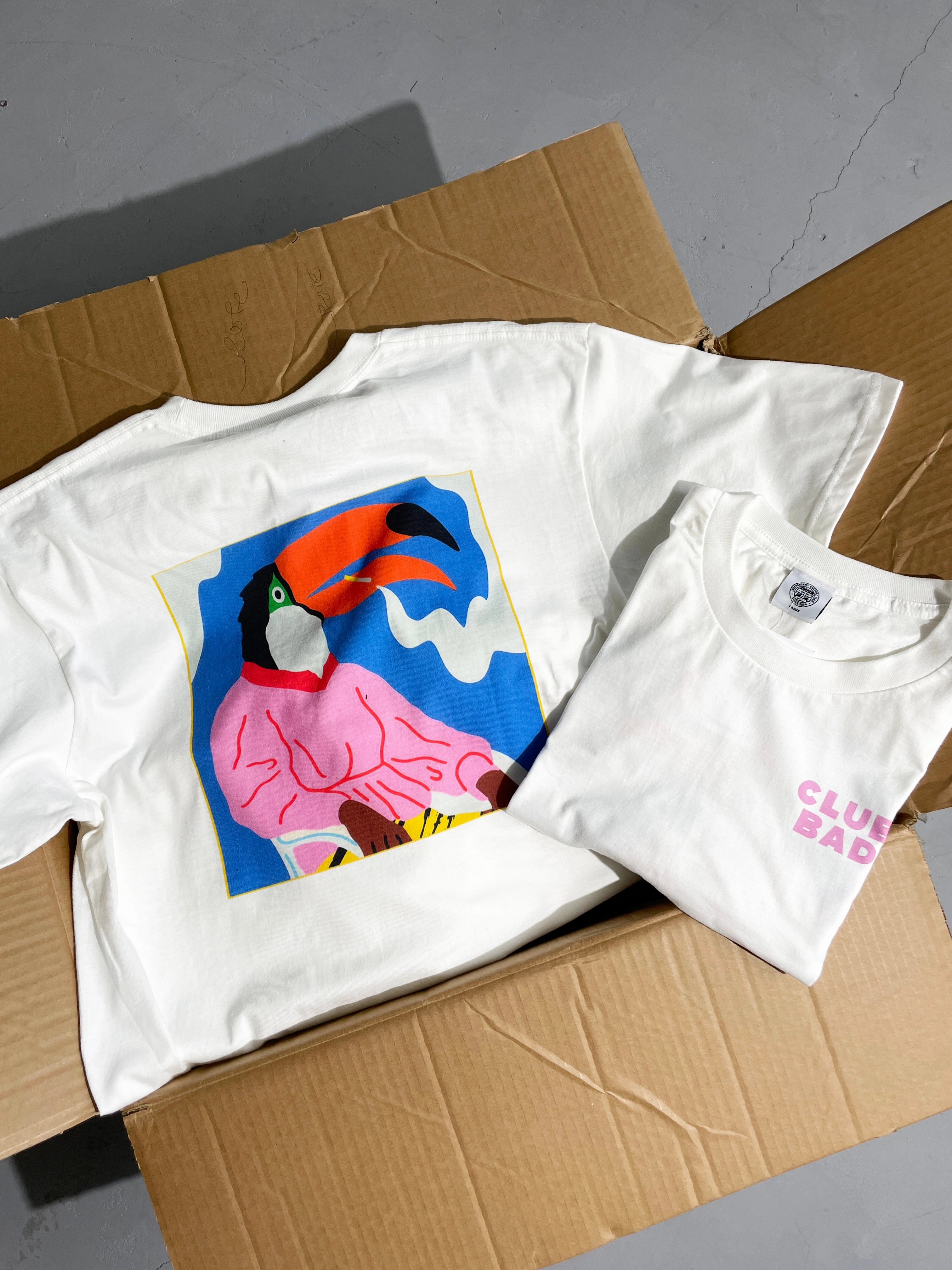 Mel?? x Club Bad 'Toucan' Tee - White Chic Wearable Basic Piece