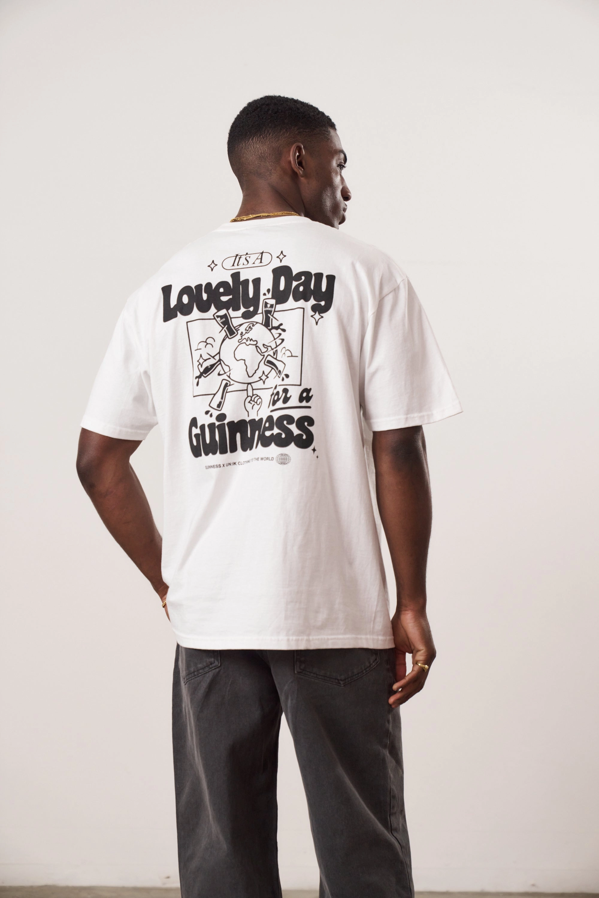Guinness x UN:IK 'Worldwide' Tee - White Indoor Event Yarn Dyed Fabric