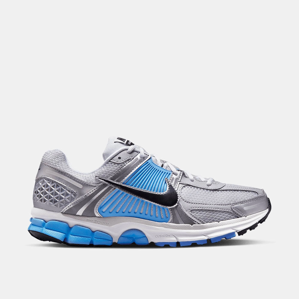 Nike Zoom Vomero 5 running in a yoga studio shoes green shoes