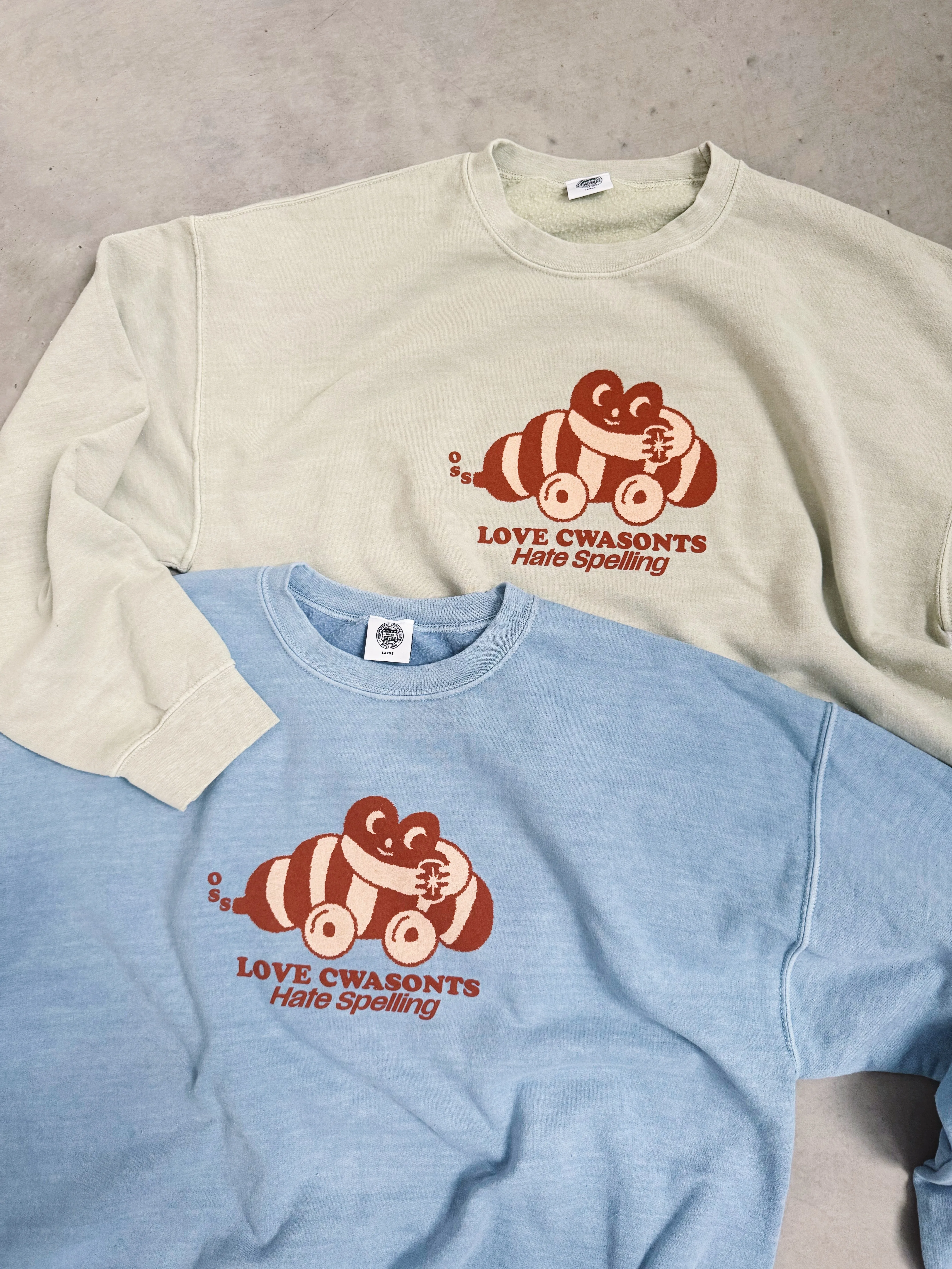 Other Side Store 'Love Cwasonts' Sweater - Vintage Washed Light Blue Ventilated Underarm Textured Fabric