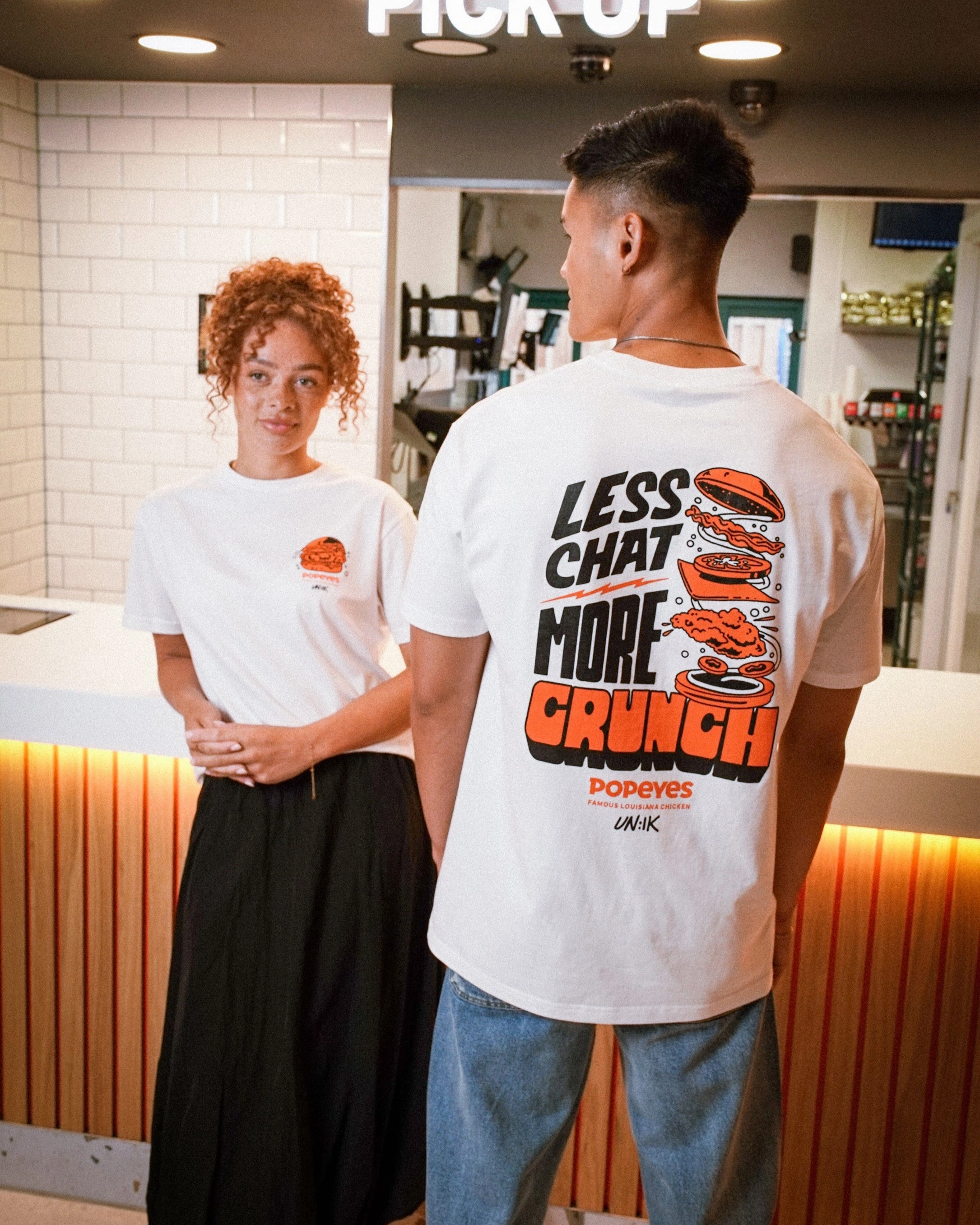 Smooth Flatlock Stitching Popeyes 'Less Chat, More Crunch' Tee - White