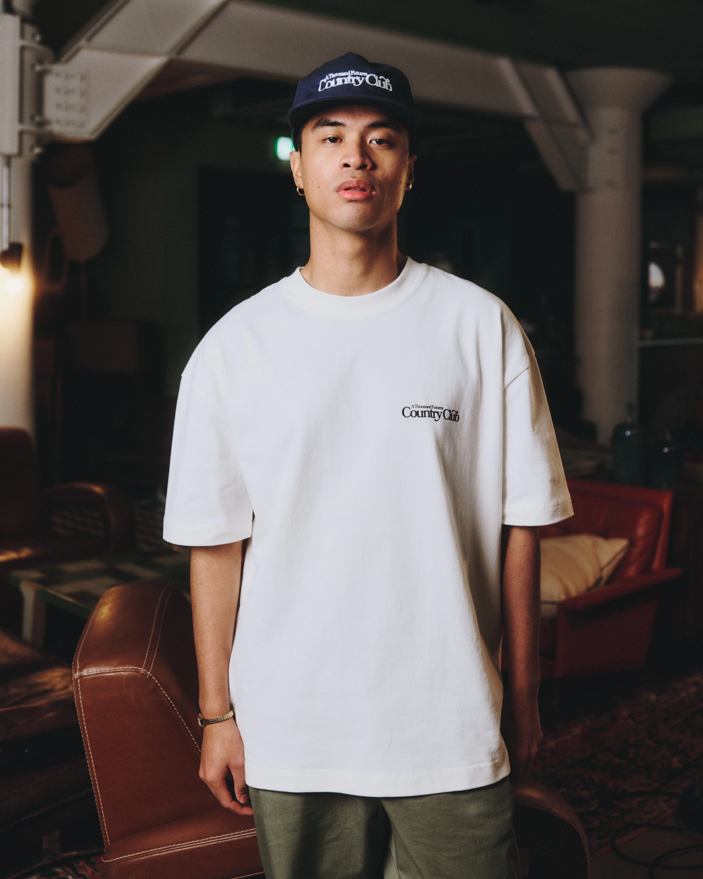 SkinFriendlyFibers men's clothing A Thousand Futures x GK 'Country Club' Tee - Off-White